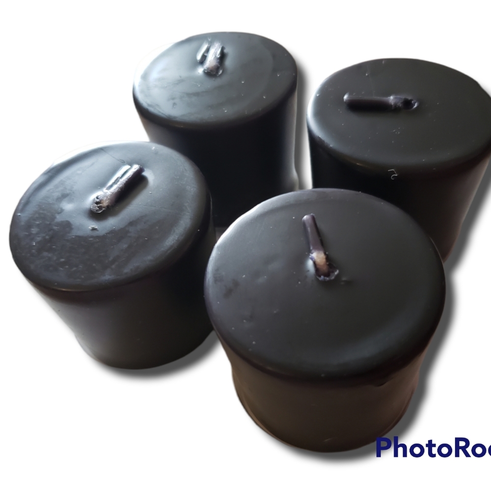 4 PK BLACK VOTIVE CANDLES. BEAUTIFUL.  LONG BURNING. 1.5 INCH HIGH.  NIB